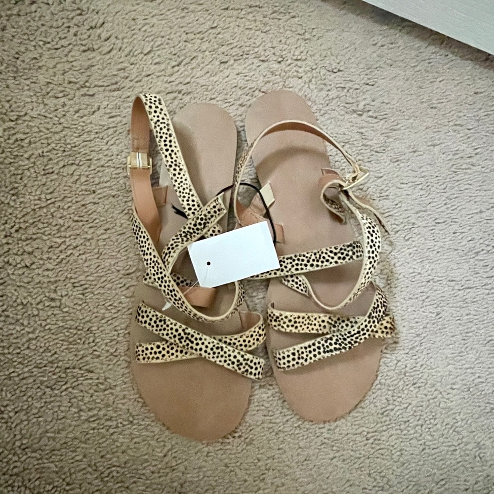 Calf hair strap sandals.